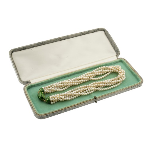 222 - A CULTURED PEARL AND ENAMEL NECKLACE,the five rows of uniform 4mm cultured pearls, to a green enamel... 