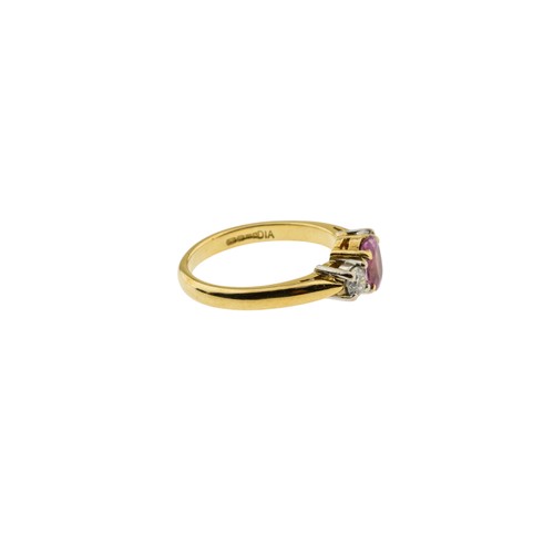 218 - A PINK SAPPHIRE AND DIAMOND RING,the oval cut pink sapphire claw set between two brilliant cut diamo... 