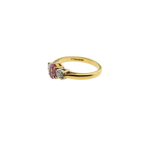 218 - A PINK SAPPHIRE AND DIAMOND RING,the oval cut pink sapphire claw set between two brilliant cut diamo... 