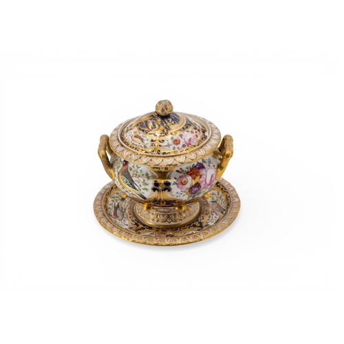 56 - A COALPORT PART SERVICE ornately decorated with birds and flowers on a dark blue ground with heavy g... 