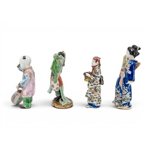 34 - FOUR JAPANESE KUTANI FIGURESLATE MEIJI / TAISHO PERIODdepicting a bijin, a musician, a boy and a pri... 