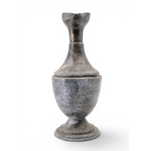 58 - A FRENCH PEWTER EWER19TH CENTURYbaluster form with tricorn mouth and scrolling serpent handle, raise... 