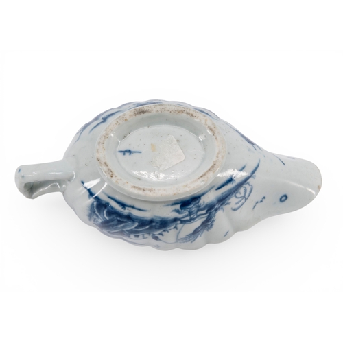 35 - LIVERPOOL BLUE AND WHITE SAUCE BOAT of lobed elongated form decorated with Chinese style scenes, mar... 