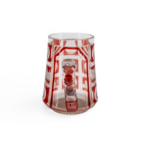 52 - A BOHEMIAN RUBY FLASH SPA TANKARD, 19th century, cut with scenes of buildings and places.13.75 cms... 
