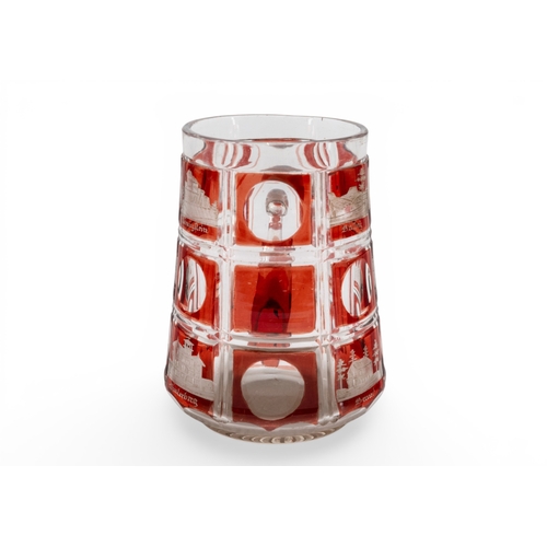 52 - A BOHEMIAN RUBY FLASH SPA TANKARD, 19th century, cut with scenes of buildings and places.13.75 cms... 