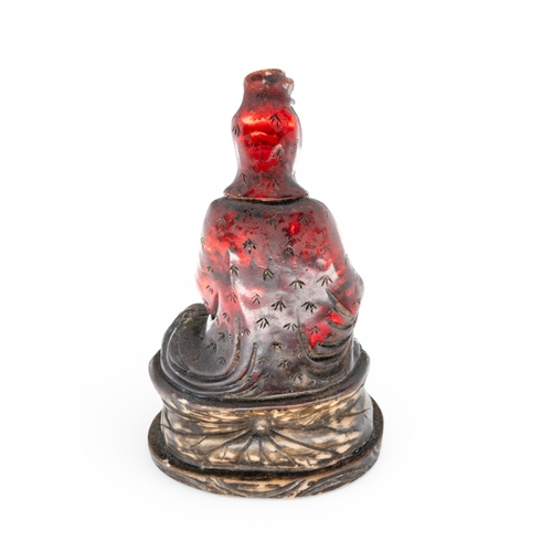 21 - A SIMULATED-AMBER FIGURE OF GUANYIN20TH CENTURY21cm high