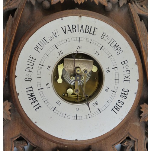 53 - A FRENCH BLACK FOREST STYLE ANEROID BAROMETERLATE 19TH/EARLY 20TH CENTURYvertically mounted thermome... 