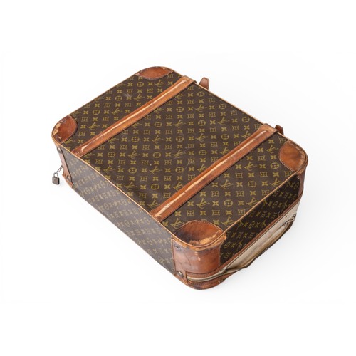 25 - A LOUIS VUITTON CASE, with monogrammed exterior and leather fittings . Distressed. 43 x 59 x 20 cms... 