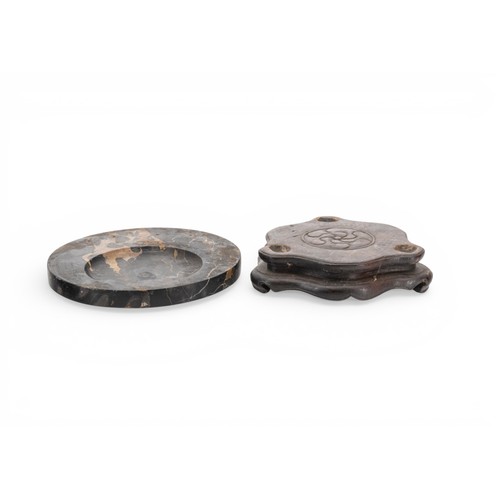 28 - A CHINESE HARDWOOD CIRCULAR VASE STAND with carved frieze and a quantity of other stands, another wi... 