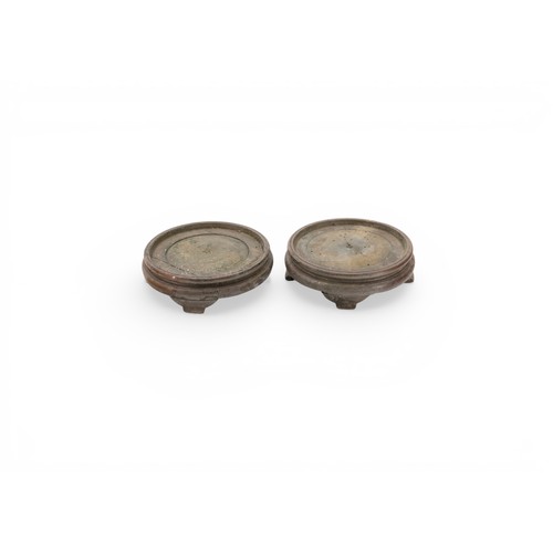 28 - A CHINESE HARDWOOD CIRCULAR VASE STAND with carved frieze and a quantity of other stands, another wi... 