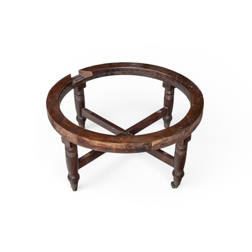 44 - A GEORGE IV MAHOGANY STANDCIRCA 1830raised on turned legs, united by a x-form stretcher and terminat... 
