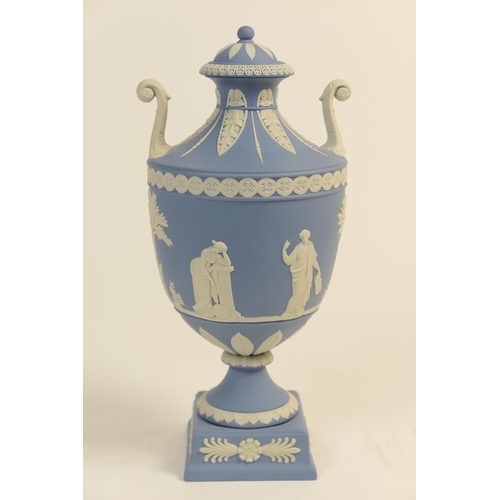 48 - Wedgwood light blue jasper pedestal urn, of Etruscan shape with lug handles at the shoulders and dec... 