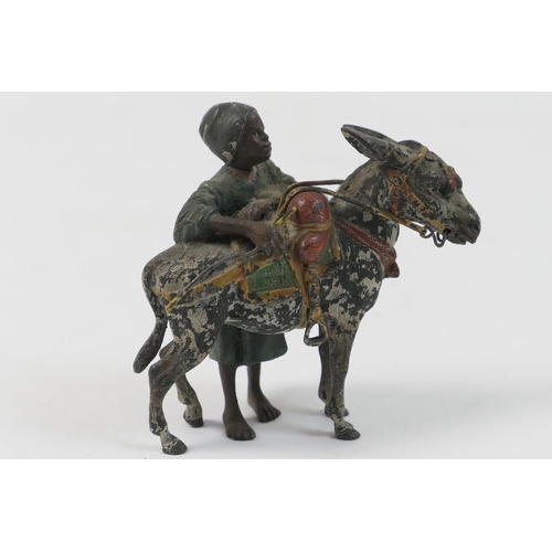 451 - Austrian cold painted bronze, circa 1900, of a Nubian boy and his mule, marked 'Vienna', 7.5cm