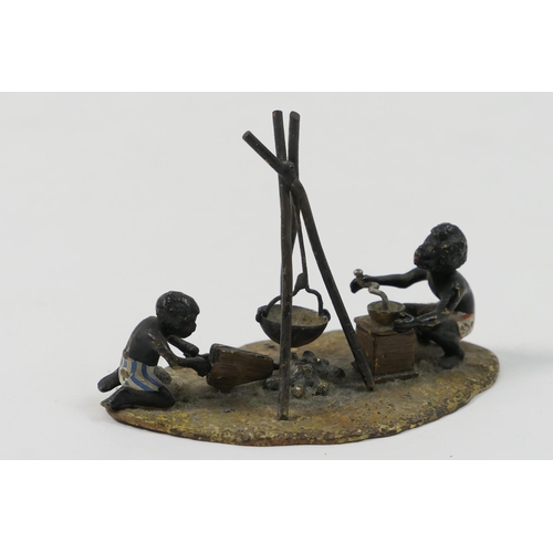 452 - Austrian cold painted bronze, circa 1900, depicting boys at a camp fire, 8cm