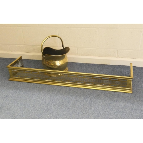 472 - Late Victorian brass helmet shaped coal scuttle, height 27cm; also a late Victorian brass rail fende... 