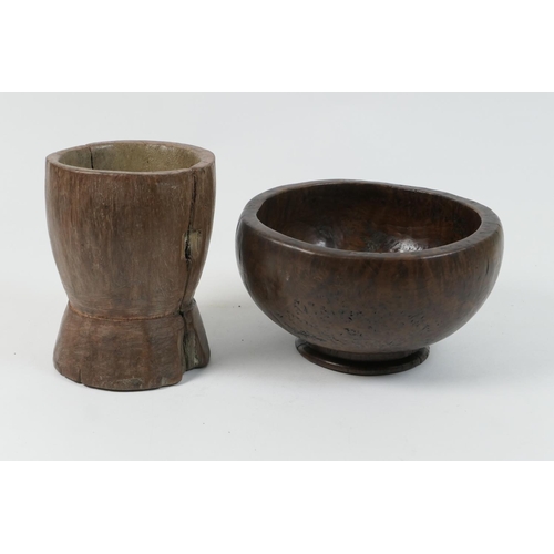 475 - Burr wood hand carved footed bowl, possibly amboyna, 19cm x 17.5cm; also an old wooden mortar, proba... 