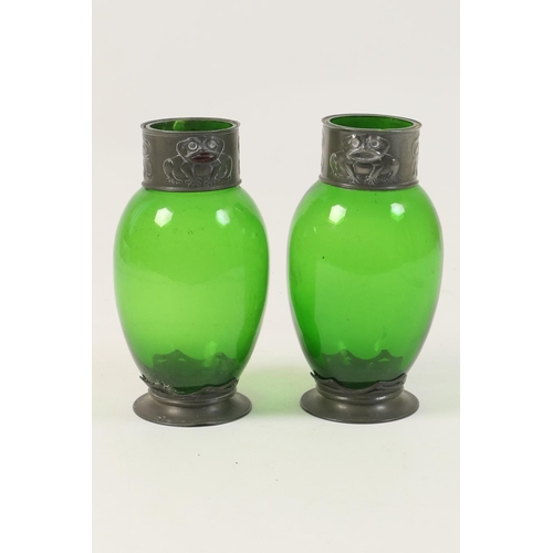 476 - Pair of Continental pewter mounted green glass flasks, attributed to Orivit, the pewter necks detail... 