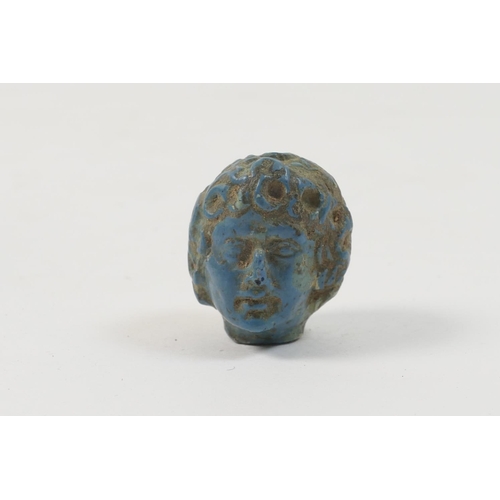 479 - Small carved blue stone head, possibly Alexander the Great, indeterminable date but possibly ancient... 