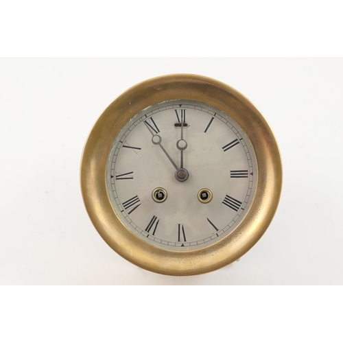 484 - Shipping interest: HMS Kestrel brass bulkhead clock, 14cm silvered dial with Roman numerals, brass w... 