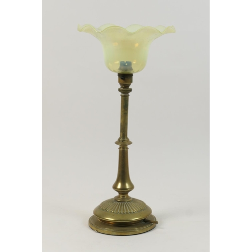 504 - Benson style brass table lamp, with vaseline glass shade tinted with blue opalescence, over a balust... 