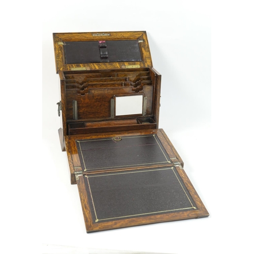 508 - Late Victorian oak stationery and writing box, the case with a hinged cover opening to reveal a comp... 