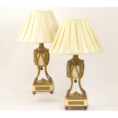 512 - Pair of French gilt ormolu and white marble cassoulettes (converted to table lamps), having an urn w... 