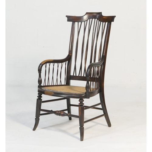 527 - Anglo-Indian ebony armchair, circa 1900, having a shaped cresting rail over a twisted stick back and... 