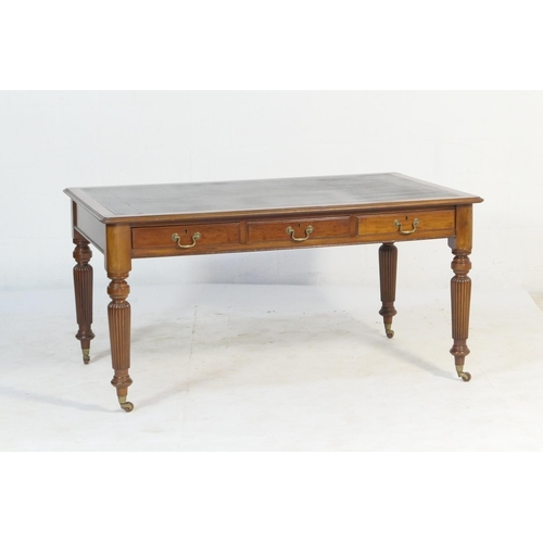 552 - Victorian mahogany library table, circa 1870, the top with a moulded edge, black rexine writing surf... 