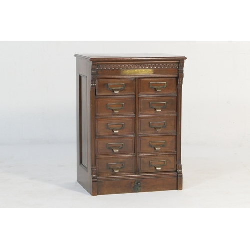 556 - Shannon walnut filing cabinet, circa 1900, fitted with ten fielded panel drawers with original label... 