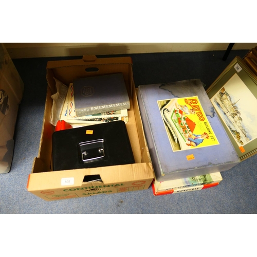 108 - Cash tin, Royal Wedding books and ephemera; also Bayko building set, Formula One and Monopoly board ... 