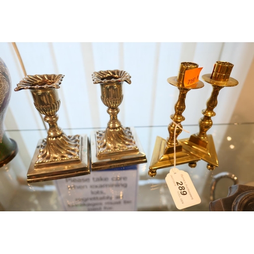 289 - Pair of Victorian brass candlesticks with tri-form bases; also further pair of silver plated Victori... 