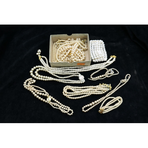 467 - Simulated pearl necklaces, bracelets etc