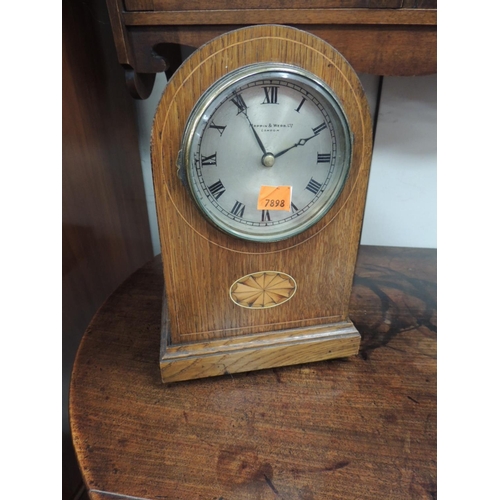 626 - Oak and inlaid mantel clock by Mappin & Webb