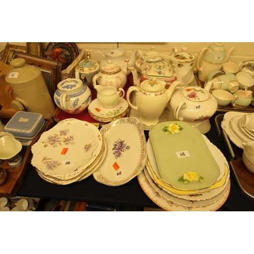 68 - Mixed teapots by Copeland, Midwinter etc; also mixed sandwich plates including Royal Doulton and Roy... 