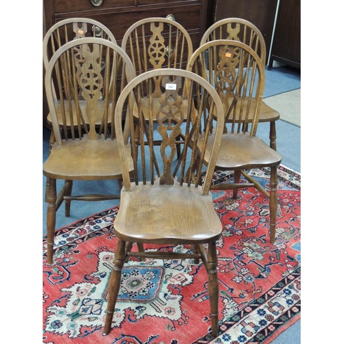 639 - Set of six wheel back kitchen chairs