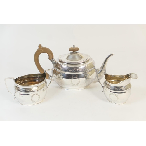 158 - Modern silver three piece tea service, by Roberts & Belk, Sheffield 1979, in Georgian style, having ... 