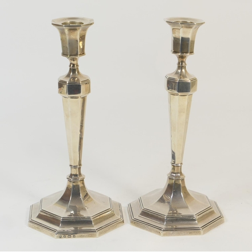 159 - Pair of George V silver candlesticks, by Hawksworth Eyre & Co., Birmingham 1934, with tapered octago... 