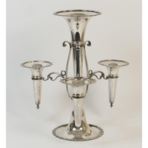 168 - Electroplated table epergne, circa 1900, having a central trumpet with gadrooned edge and three smal... 