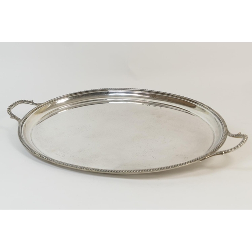 170 - Silver serving tray by Lowe & Son, Chester 1960, oval form with gadrooned edge and carrying handles,... 