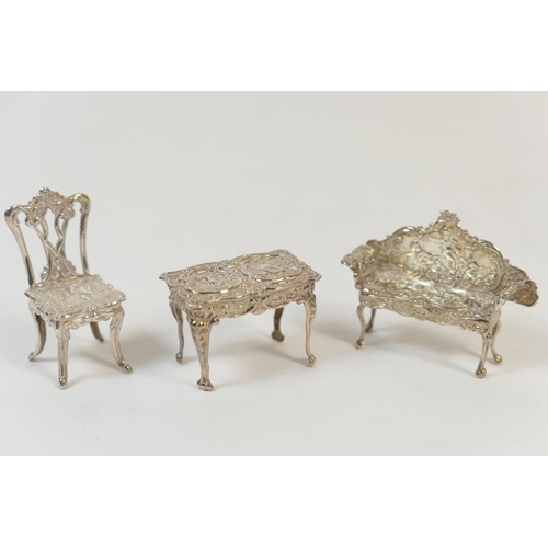 175 - Three modern silver ornamental miniature pieces of furniture, Birmingham 1961/2 comprising a Rococo ... 