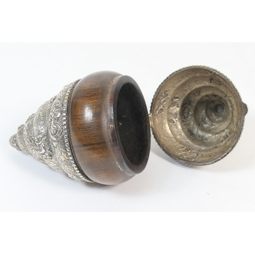 180 - Unusual wooden and white metal double conch form box, possibly Tibetan, having a hinged cone shaped ... 