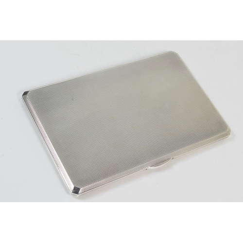 182 - Modern silver cigarette case, London 1960, rectangular form with plain engine turned decoration, 13.... 