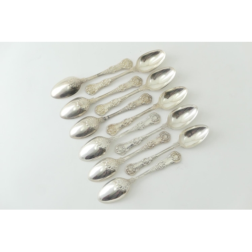 192 - Eleven Victorian silver Queens pattern dessert spoons,  by Lias & Lias, London 1857/61, all engraved... 