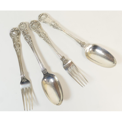 194 - Two George IV silver Queens pattern table forks, and two matching table spoons, by William Chawner, ... 