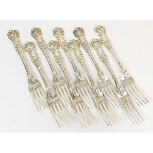 195 - Nine Victorian silver Kings pattern table forks, by George Adams, London 1855 x 7 (six being engrave... 