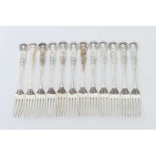 198 - Twelve Victorian silver Kings pattern table forks, by George Adams, London 1843 x 8, and 1865 x 4, a... 