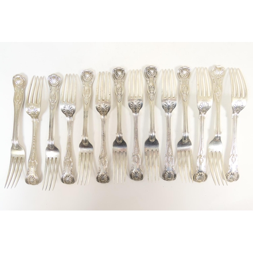 207 - Nine Victorian silver Kings pattern dessert forks, London 1872, each engraved with an italic monogra... 