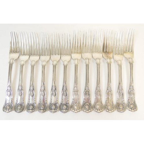 210 - Twelve Victorian silver Kings pattern dessert forks, six by William Eaton, London 1845 and six by Ch... 