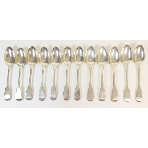 232 - Silver fiddle pattern spoons comprising: two table spoons by William Woodman, Exeter 1832; two Glasg... 