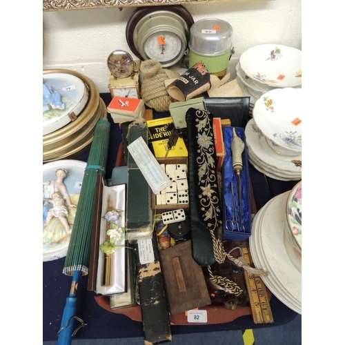 82 - Mix of miscellany including vintage thermos vacuum jar, a knotted rope doorstop, carriage clocks, sc... 